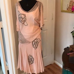 Silk, beaded top w/matching skirt.